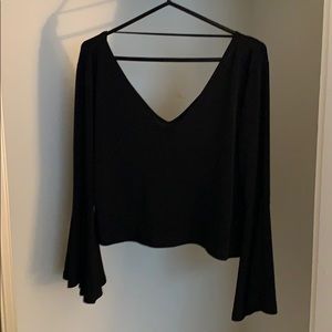 Bell sleeve deep v-neck blouse